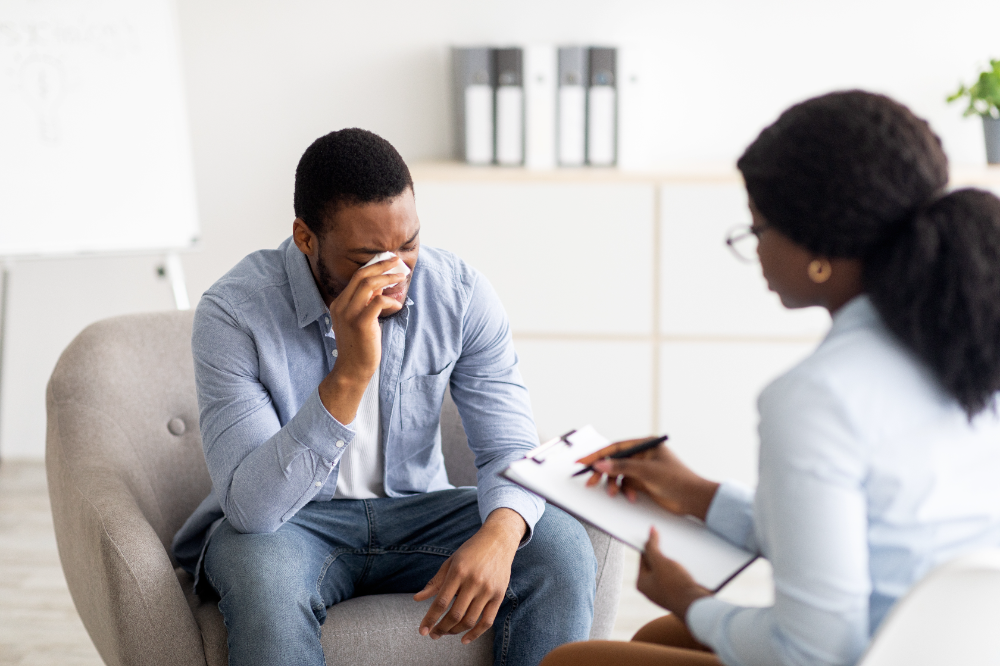 Male victim of sexual assault talking with a lawyer