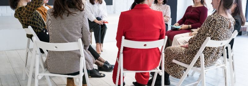 support group of female sexual assault survivors talking